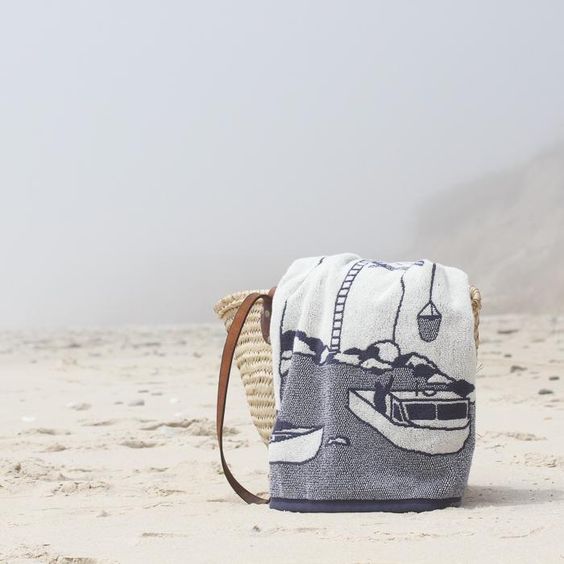 Papat Beach Towel in a Market Basket on the Beach